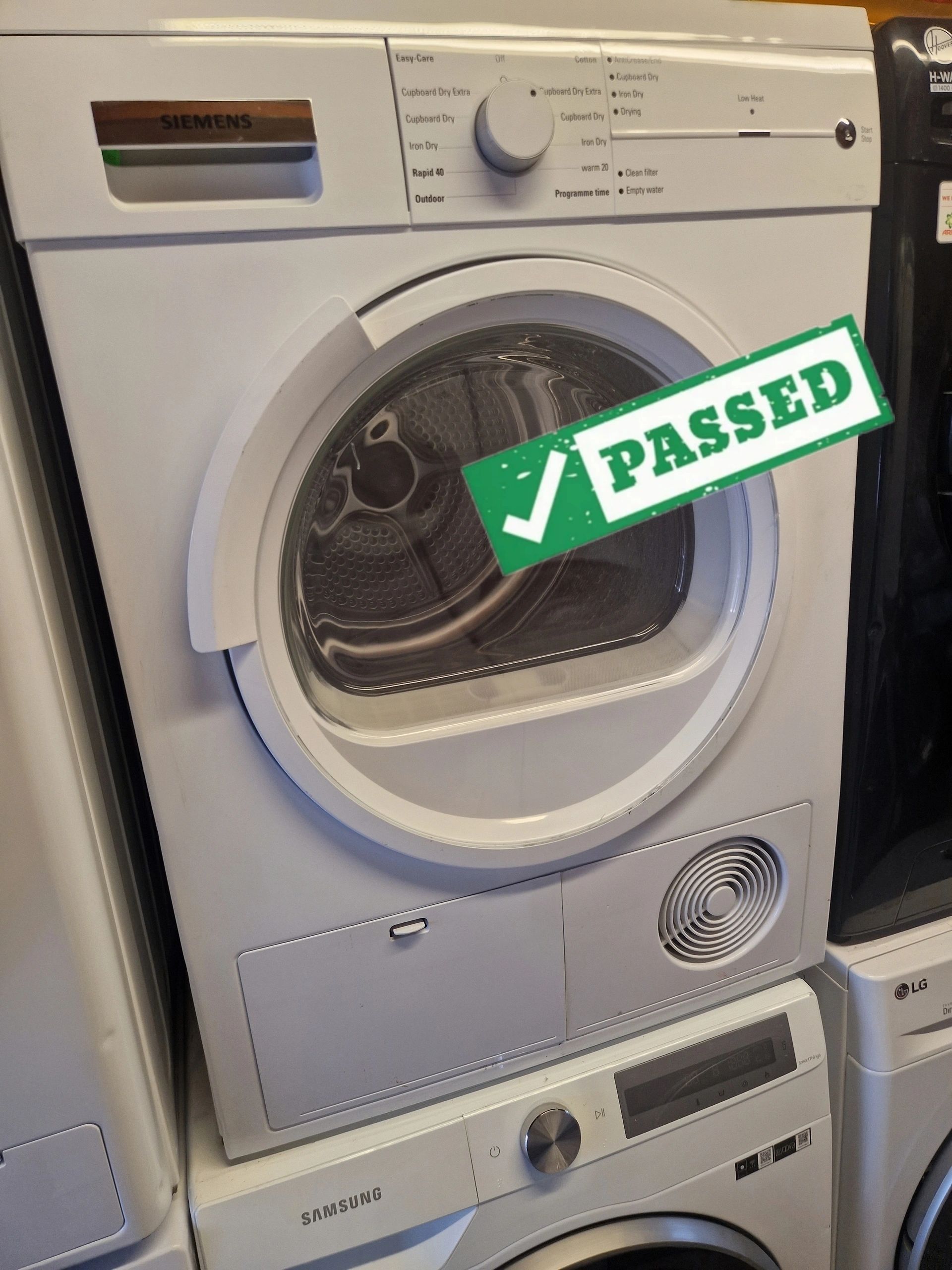 White Siemens 7kg refurbished condenser tumble dryer photographed for Like New Appliances